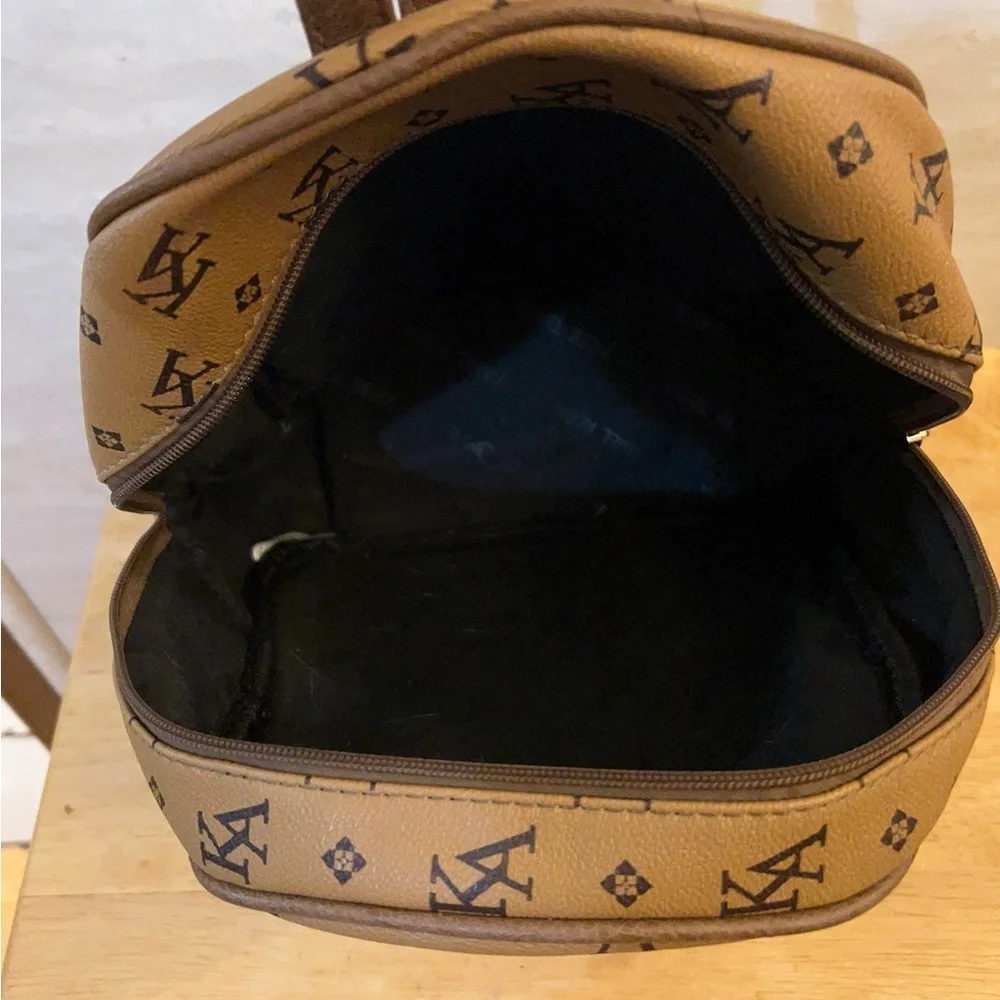 KA Monogram Backpack in Tan 100% polyurethane